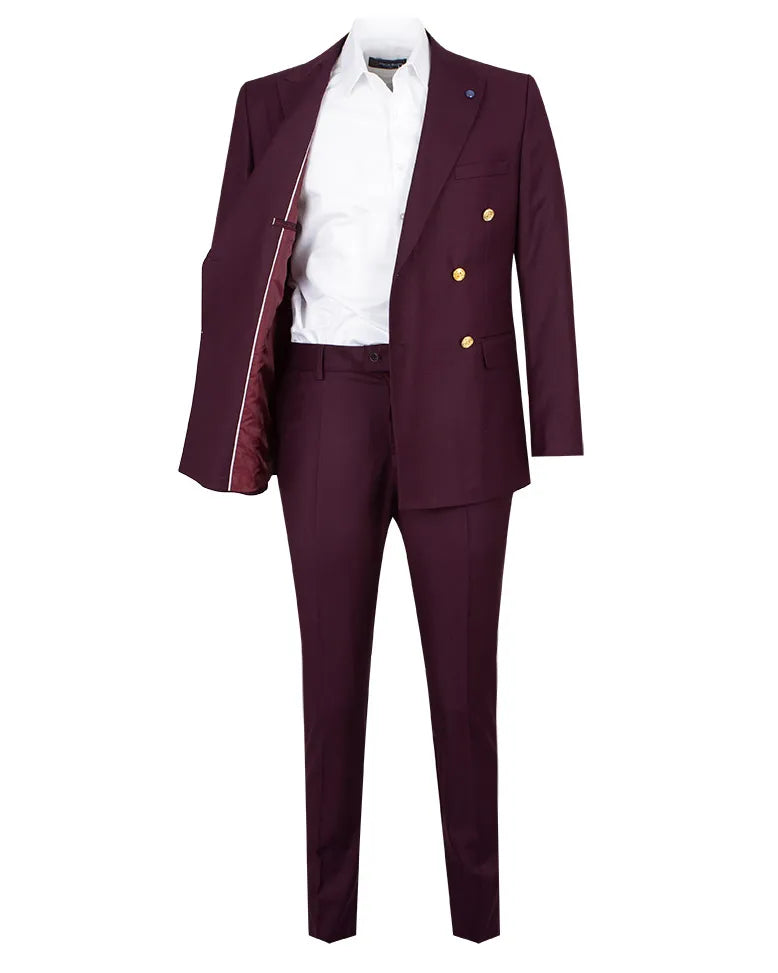A men's three-piece suit in deep burgundy, featuring a double-breasted blazer with gold buttons, matching trousers, and a white dress shirt, displayed on a white mannequin torso against a plain white background.